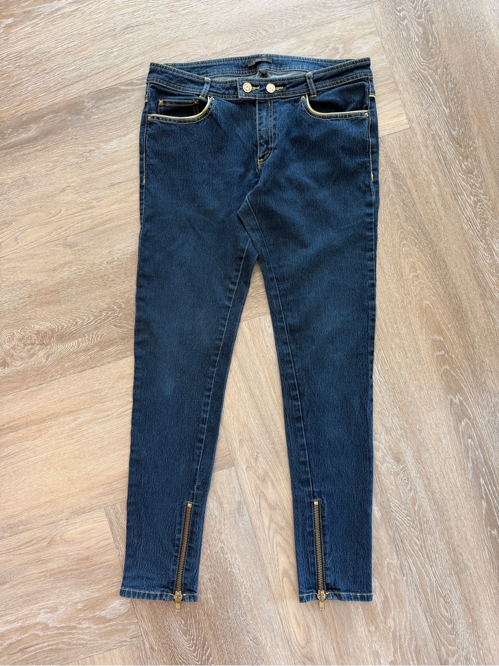 Rachel Zoe dark wash skinny jeans with ankle zipper and yellow silk piping